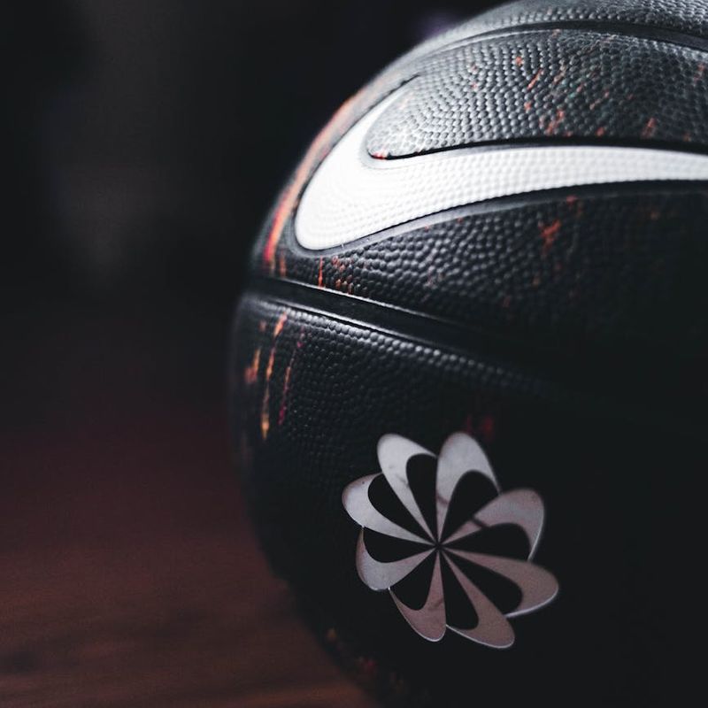 Close up of sports equipment on a dark floor